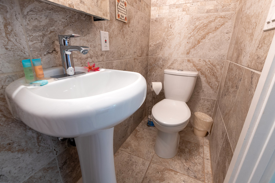 Tiled bathroom and amenities